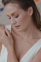 Muse | Modern stud earrings with freshwater pearls and baguette cut crystals